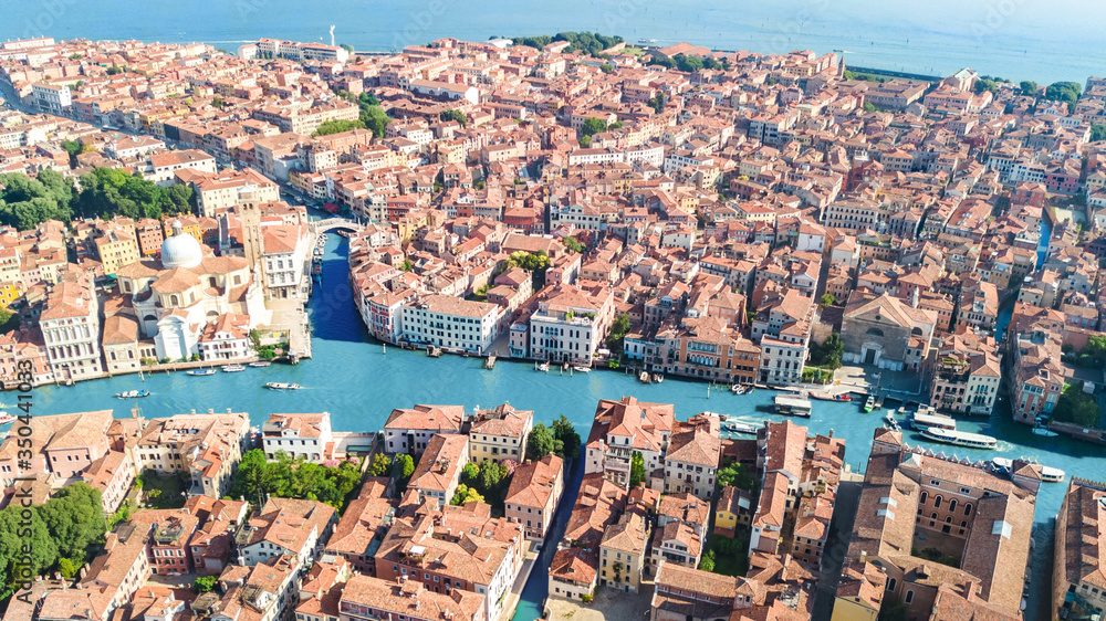 Venice city Grand Canal and houses aerial drone view, Venice island cityscape and Venetian lagoon from above, Italy
