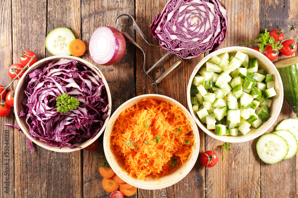 assorted of vegetable salad, cabbage, cucumber and grated carrot