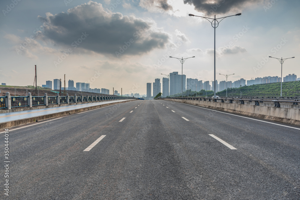 Perspective view of urban asphalt highway horizon