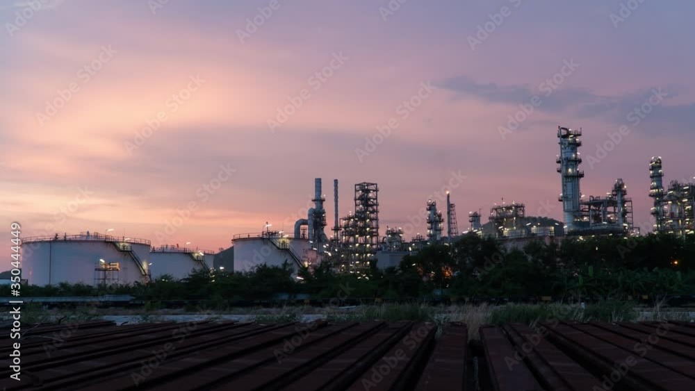 TimeLapse manufacturing oil refinery terminal is industrial facility for storage of oil and petrochemical. oil manufacturing products. power electric plant. Time lapse Day to Night b roll video 4k. TimeLapse manufacturing oil refinery terminal is industrial facility for storage of oil and petrochemical. oil manufacturing products. power electric plant. Time lapse Day to Night b roll video 4k.