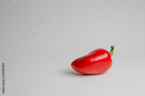 PEPPER IN THE FORM OF PERUVIAN CHILE WITH WHITE BACKGROUND