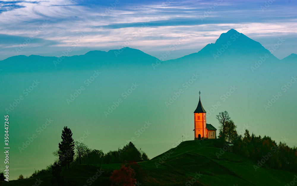 Fototapeta premium the church on the hill at the beginning of the night