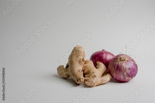 TWO PERUVIAN RED ONIONS AND GINGER