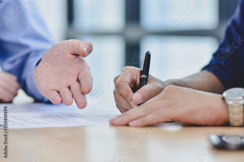 Man signature contract agreement buying home