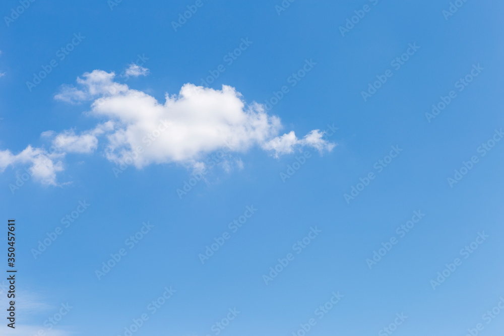 White cloud over clear blue sky, nature background, outdoor day light White cloud over clear blue sky, nature background, outdoor day light