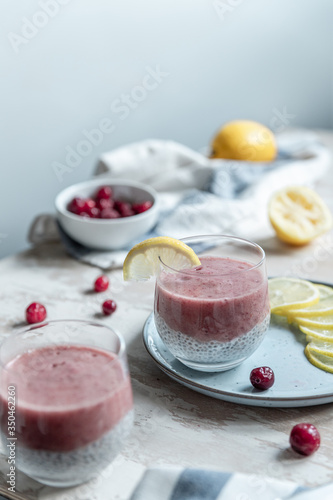 Summer dessert chia seed pudding in almond milk with berry and lemon puree. Super Food, vegan