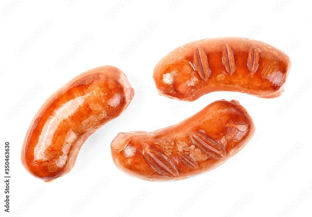 Grilled sausages isolated on a white background. Fried meat sausages. Grilled sausages isolated on a white background. Fried meat sausages.