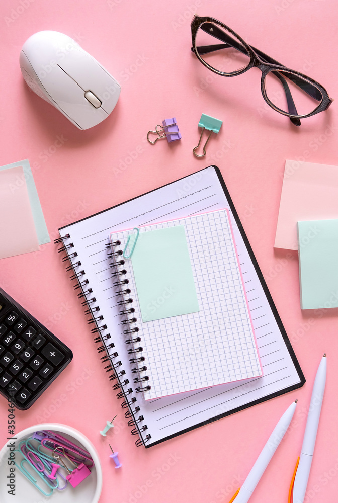 Blank paper notebook near stationery items.Mockup for design. Blank paper notebook near stationery items.Mockup for design.
