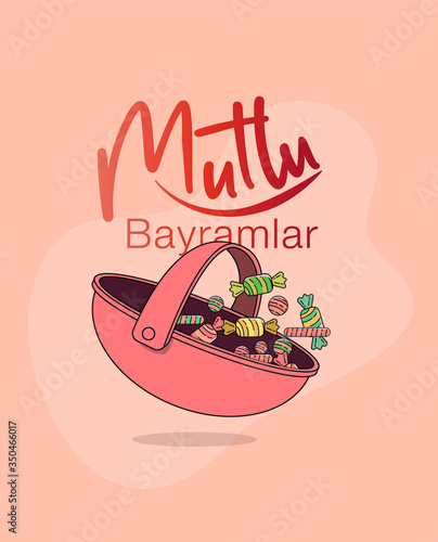 a pink basket with colorful candies in it for celebrating ramadan feast of all muslim families and a text saying 'have a happy feast' 