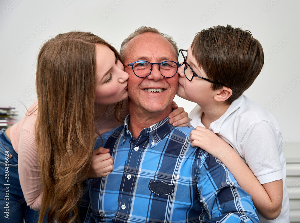 Grandchildren love your grandpa and kiss your grandpa and have fun Grandchildren love your grandpa and kiss your grandpa and have fun