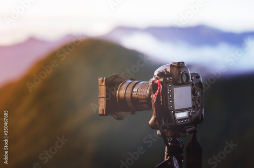 Camera take a photo of sunrise view landscape, Traveler conception. photo