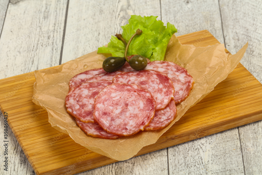Spanish Salchichon sausage with salad Spanish Salchichon sausage with salad