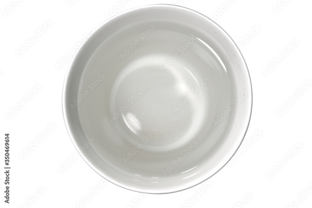 There is a light reflecting the water. The glass is white.water in glass top view for drink isolated White Background There is a light reflecting the water. The glass is white.water in glass top view for drink isolated White Background