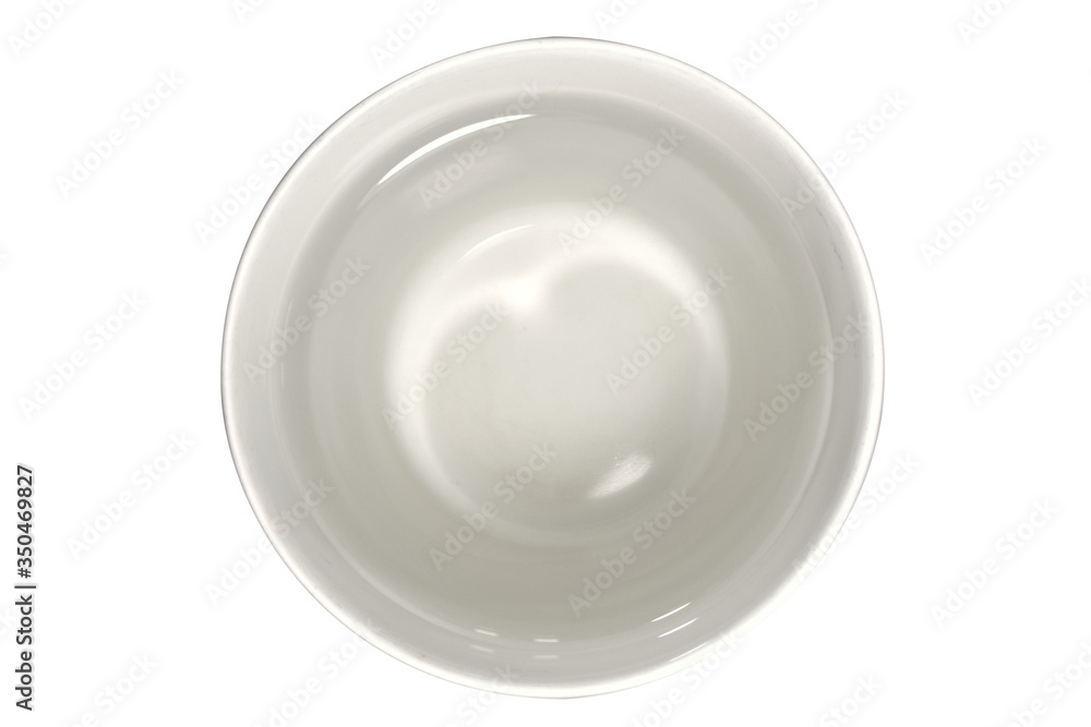 There is a light reflecting the water. The glass is white.water in glass top view for drink isolated White Background There is a light reflecting the water. The glass is white.water in glass top view for drink isolated White Background