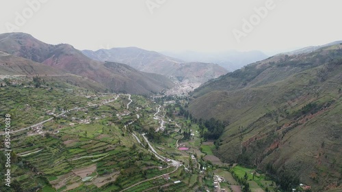 Road that crosses a beautiful  valley in the middle of the andes mountain in Peru called EL VALLE DEL MANTARO. photo