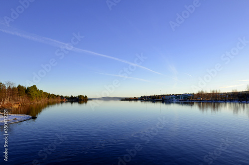 Lake Inari with clear blue sky in Finland