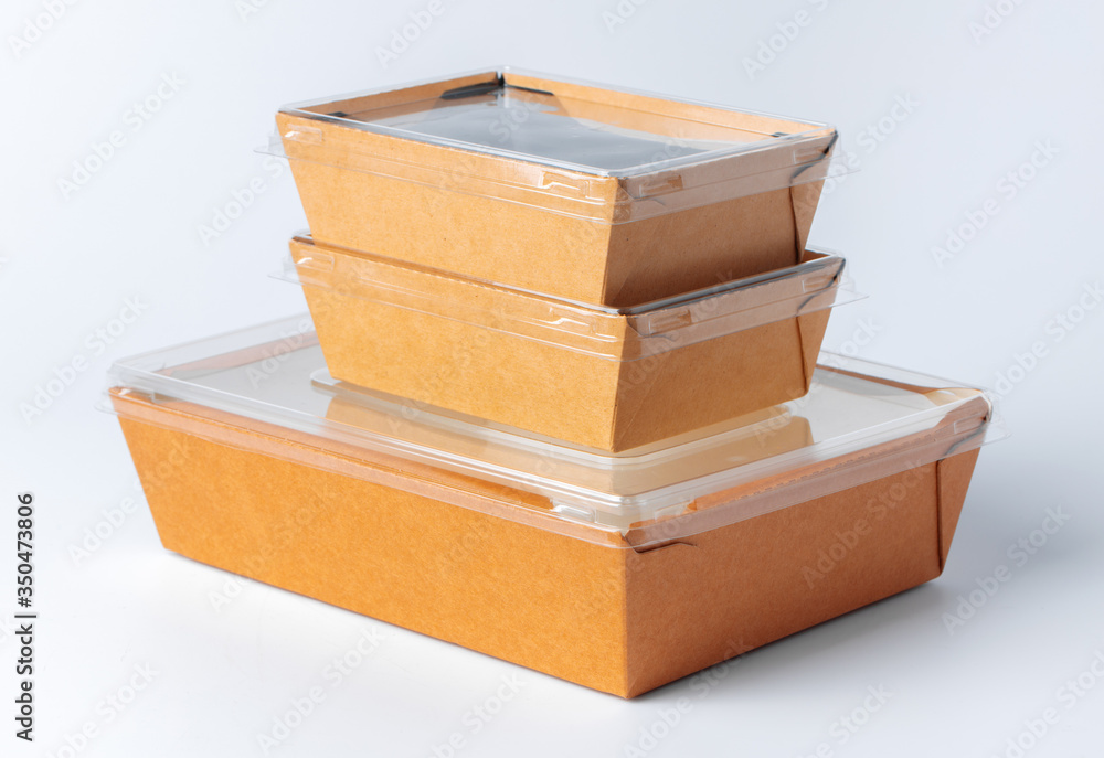 Cardboard brown food box pack isolated on white background close up Cardboard brown food box pack isolated on white background close up
