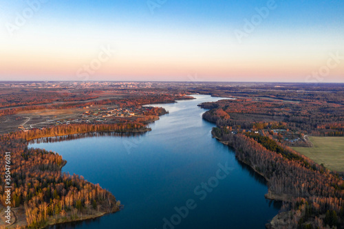 View from the drone of the Uvodsky reservoir in the rays of the setting sun  Russia.