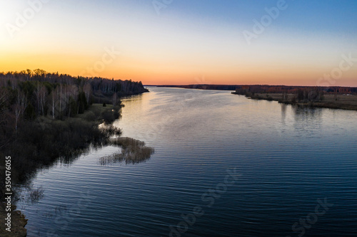 Red-orange sunset on the Uvodsky reservoir Ivanovo region  Russia.