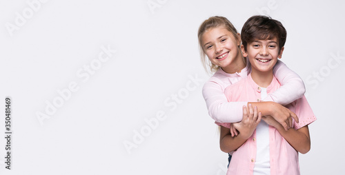 Konstfotografi Copy-space sister hugging brother