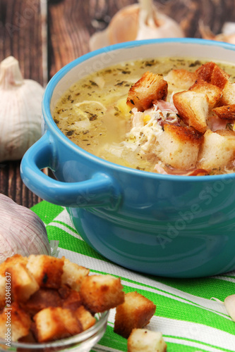 A bowl with traditional Czech garlic soup cesnecka photo