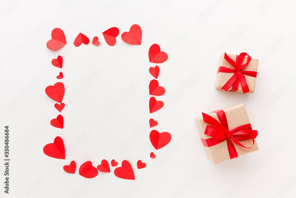 Top view of paper hearts frame with presents Top view of paper hearts frame with presents