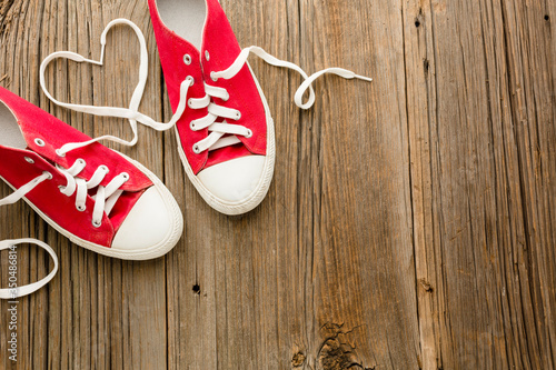 Flat lay of valentines day shoes with copy space
