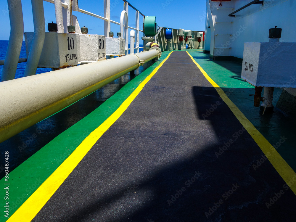 Safety walkway on board the ship. Black yellow safety walkway. anti skid walkways. anti slip walkways.