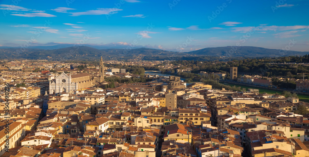 the Arno river and the Basilica of Santa Croce on the background of city streets the Arno river and the Basilica of Santa Croce on the background of city streets