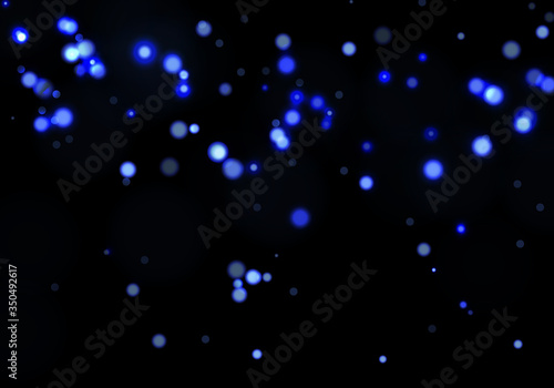 Blue bokeh light background. Sparkle effect with particles. Magic overlay dust. Glitter blur texture.