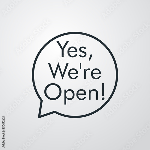 Icono plano con texto Yes We're Open en goblo de habla en fondo gris