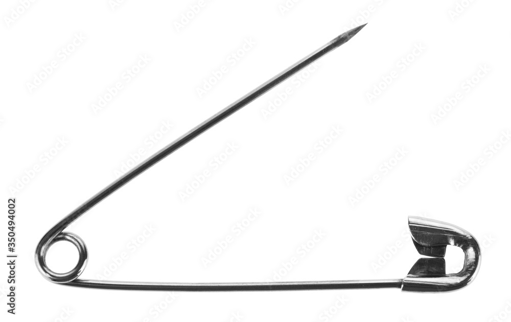 Metal pin Isolated on a white background close-up. View from above. Metal pin Isolated on a white background close-up. View from above.