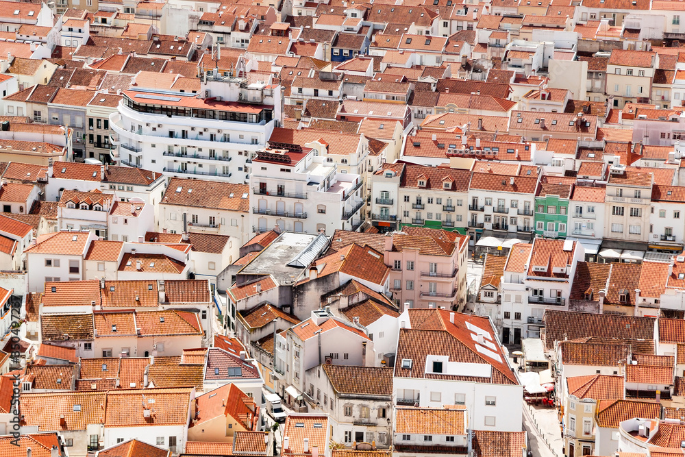 Panoramic view of orange clay tile rooftops in Lisbon, Portugal