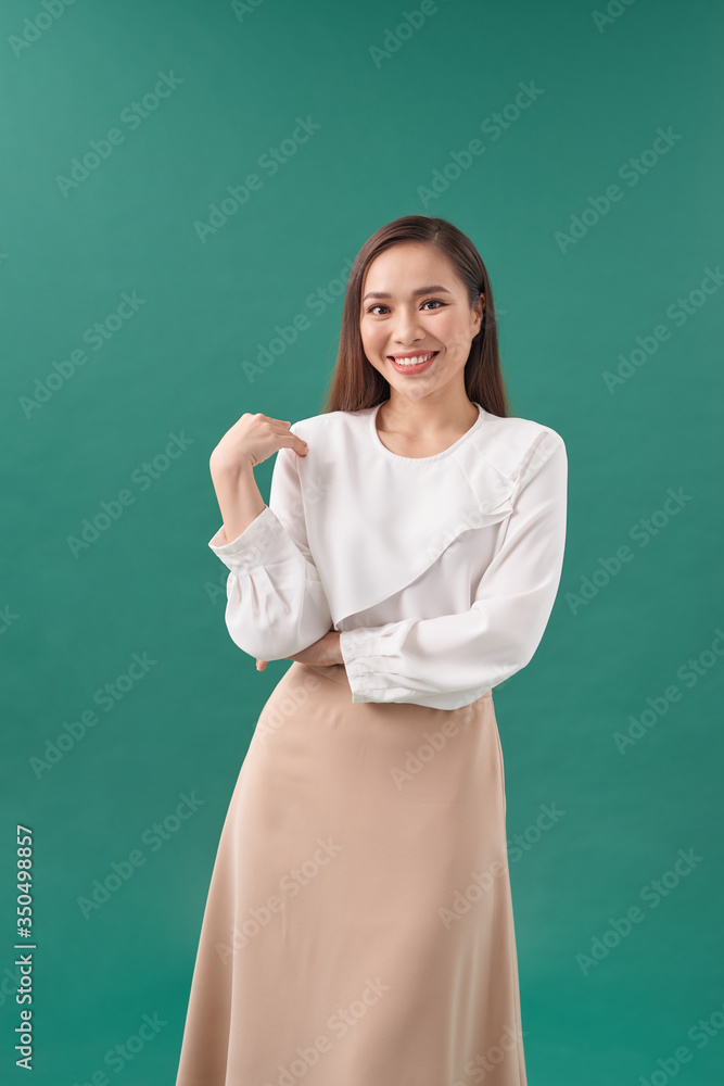 portrait of asian businesswoman on turquoise background