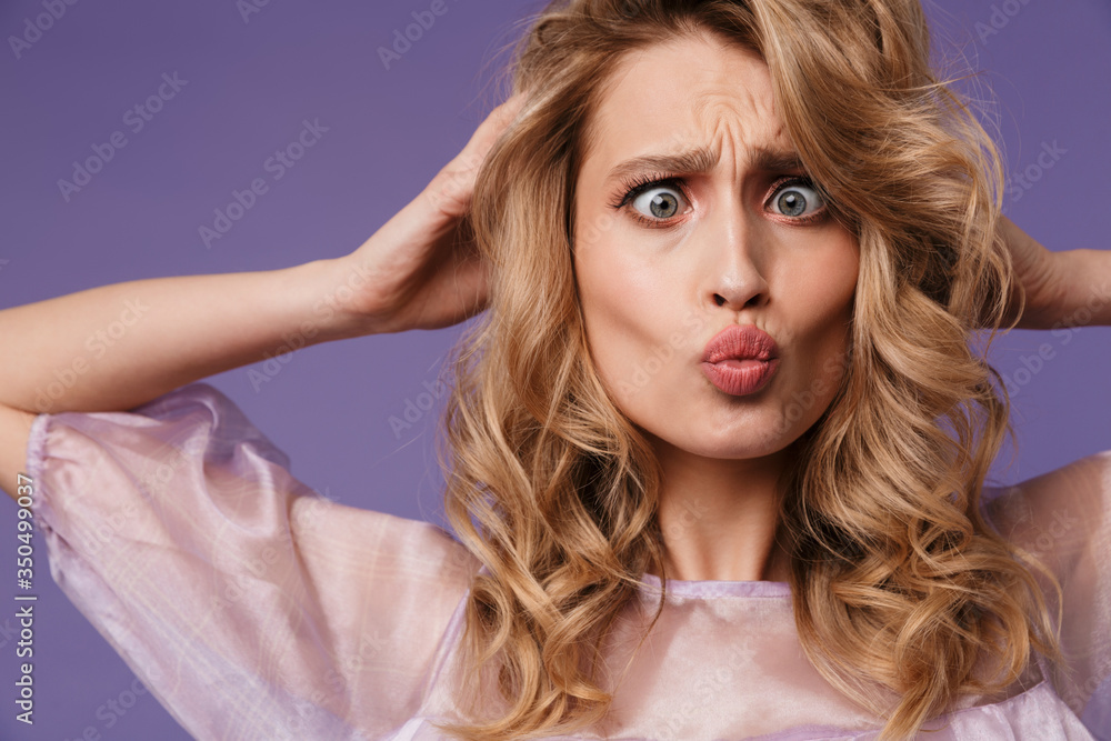 Image of amusing caucasian woman grimacing and making fun on camera Image of amusing caucasian woman grimacing and making fun on camera