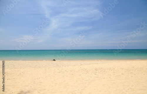 Beautiful tropical beach, white sand and turquoise water with blue sky.