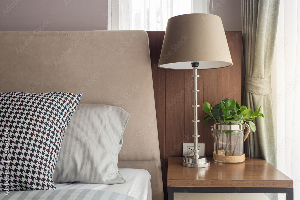 Fotografie Bedside lamp in the bedroom