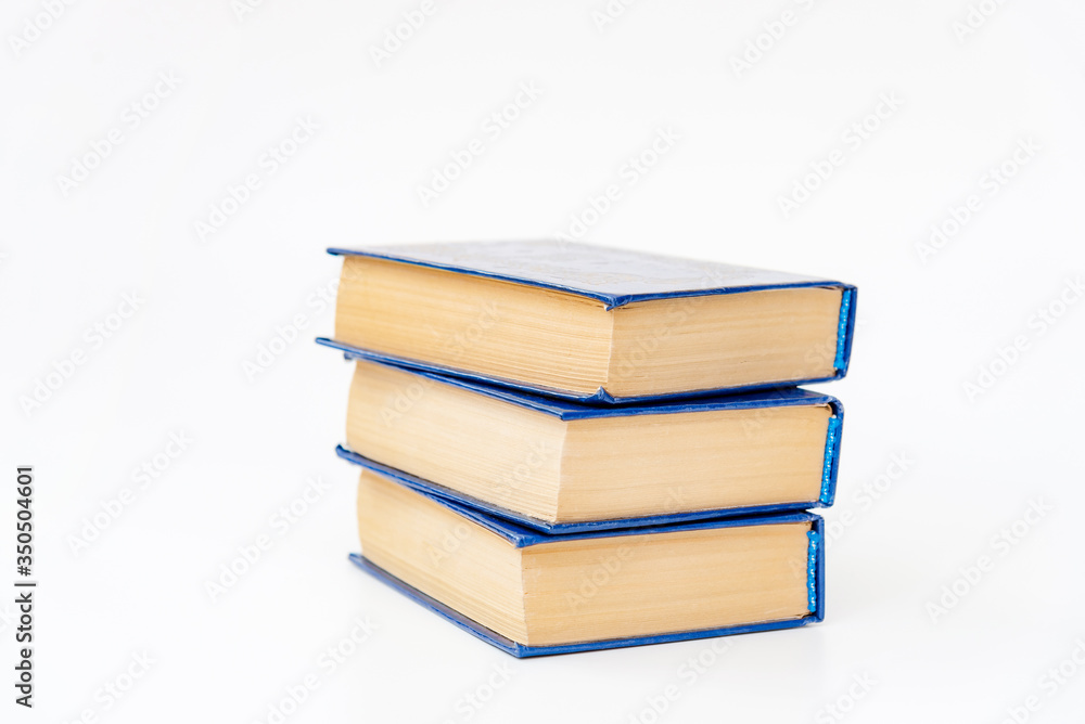 Three old books stack isolated on white Three old books stack isolated on white