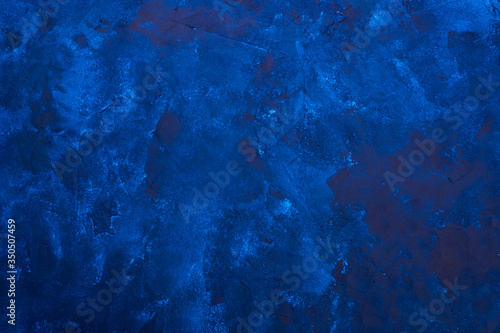 Deep blue grunge textured background