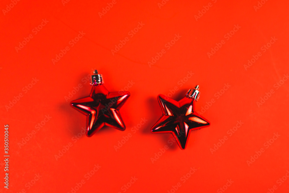 red ornaments on red background.