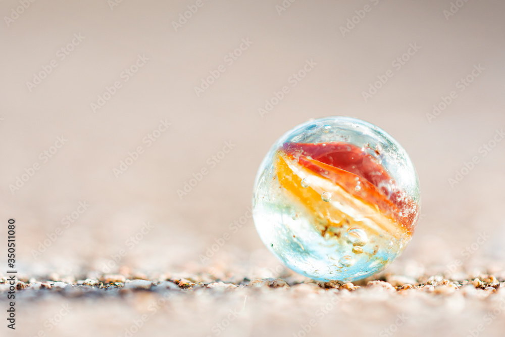 Orange and yellow marble ball