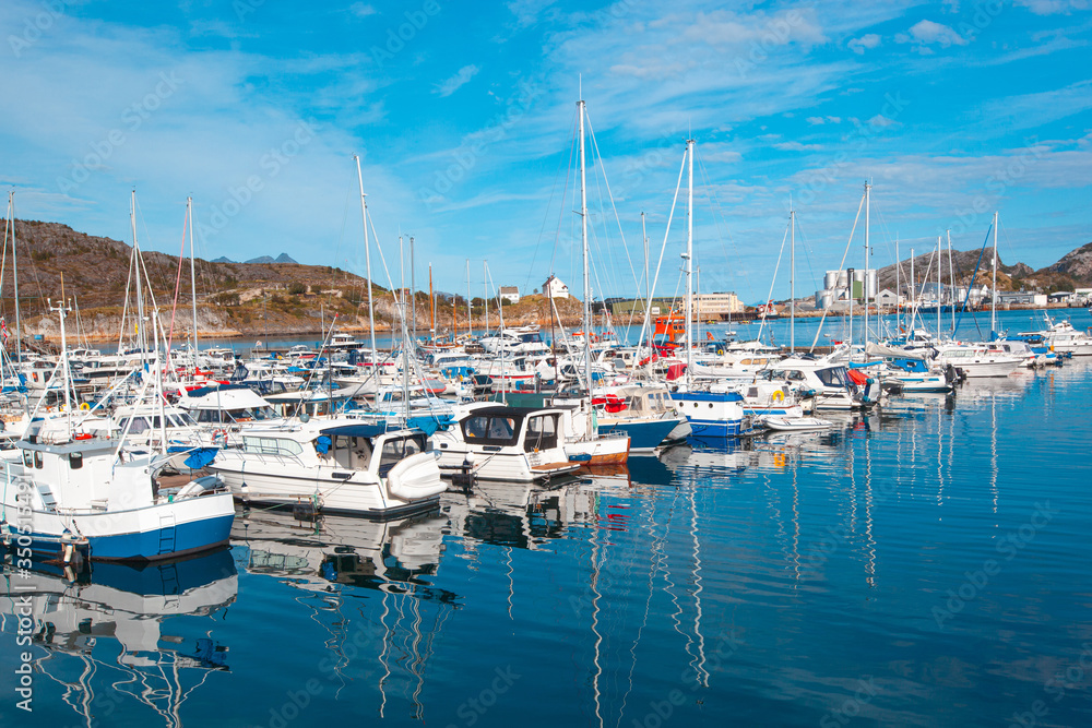 Port for small vessels. Berth with yachts, boats, sailboats, boats.
