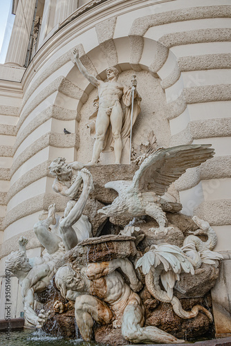 Power of Land fountain at Hofburg Imperial Palace ant Saint Michael Square, outdoor, Vienna, Austria photo