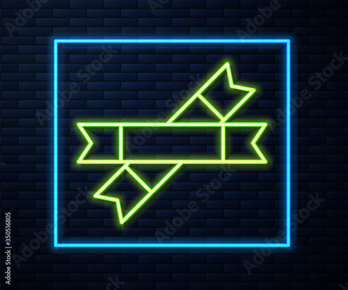 Glowing neon line Sugar stick packets icon isolated on brick wall background. Blank individual package for bulk food products as coffee, salt, spices. Vector