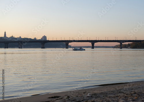 view of the river and paton bridge at sunset © Денис Величко