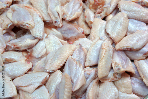 fresh chicken wings at the market