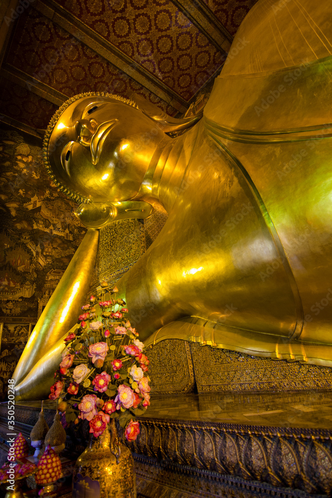 Reclining Buddha gold statue. Wat Pho - Bangkok, Thailand