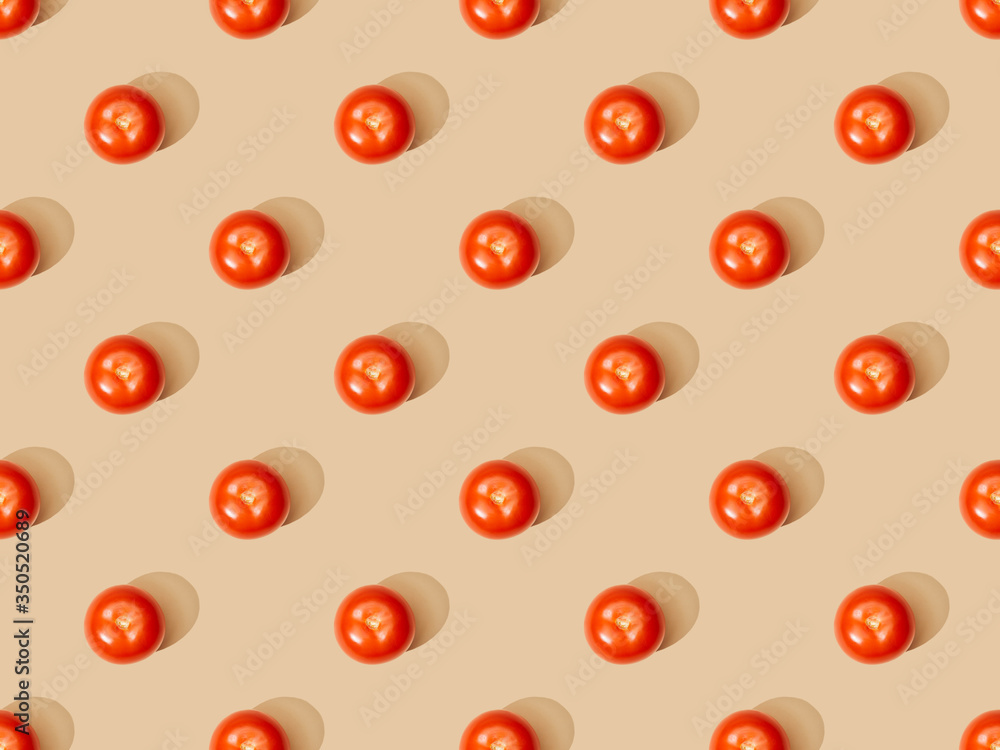 top view of ripe fresh tomatoes on beige background, seamless pattern top view of ripe fresh tomatoes on beige background, seamless pattern