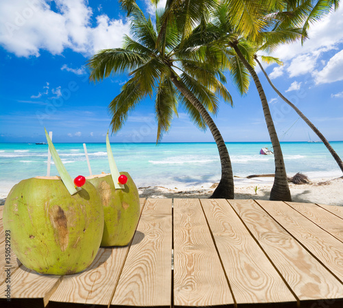 Wooden tabletop with coconu...
