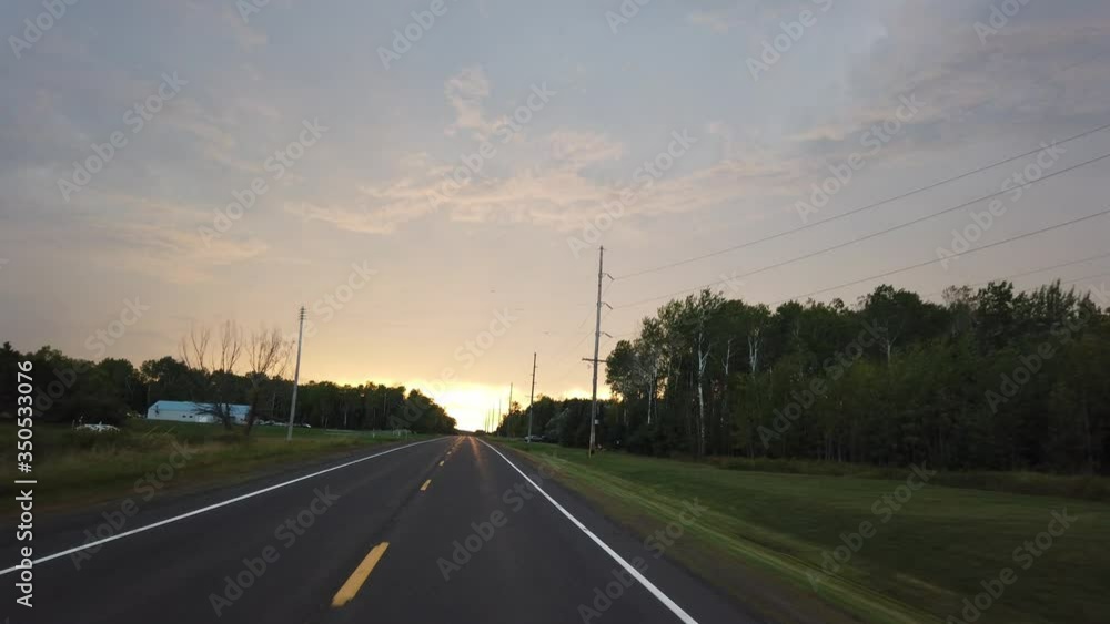 nice sunset colors while driving in a freeway, nice sunset colors while driving in a freeway,
